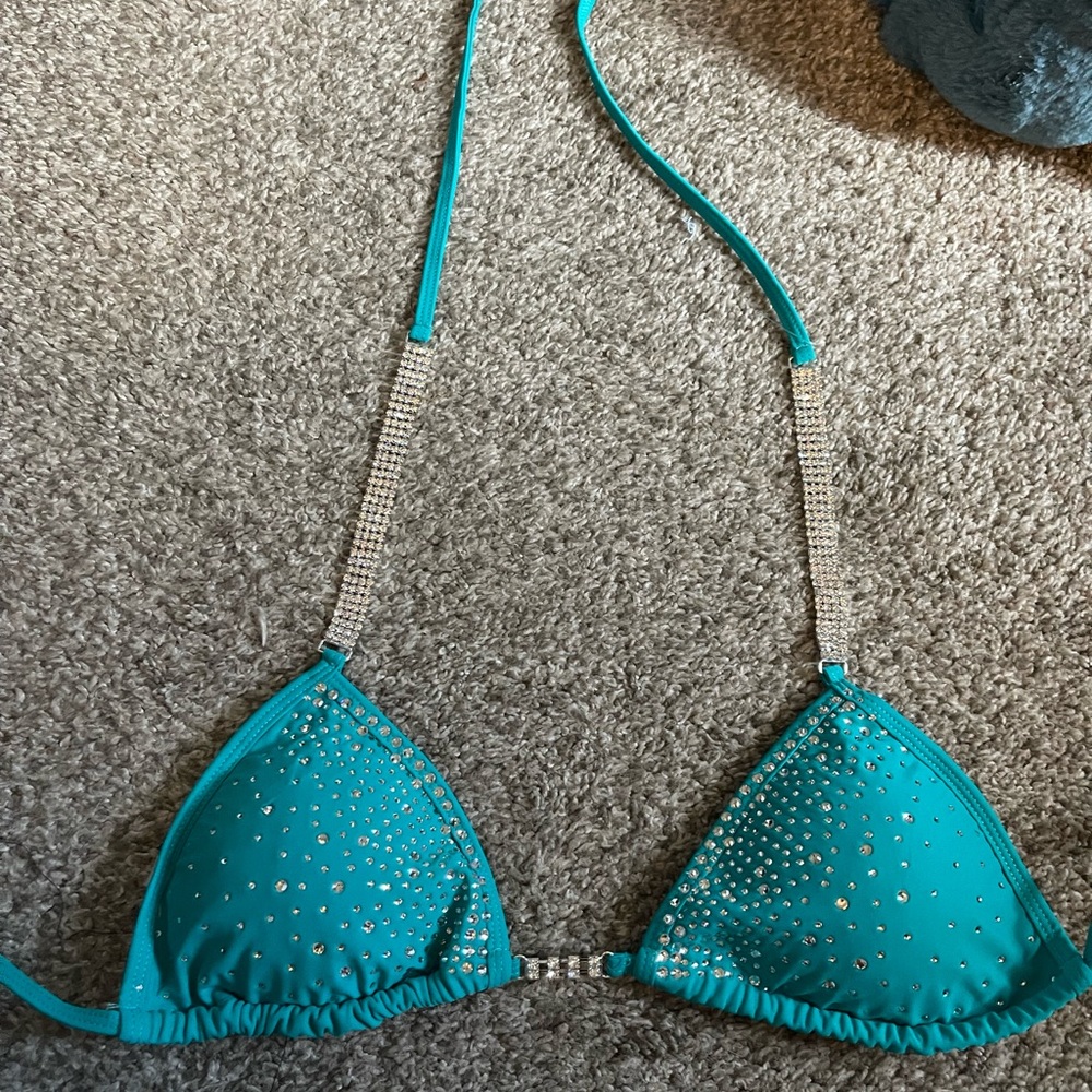 Bikini competition suit never worn, size small, removable cup pads.